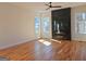 Spacious living room with hardwood floors and modern black fireplace at 721 Cascade Sw Ave, Atlanta, GA 30310