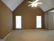 Bonus room featuring high ceilings, carpet floors, and large windows with blinds for natural light at 180 Sunderland Cir, Fayetteville, GA 30215