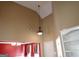 Interior with a soaring ceiling, neutral paint, modern lighting, and access to other living areas at 180 Sunderland Cir, Fayetteville, GA 30215