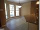 Eat-in kitchen nook with bay windows and speckled granite countertops, offering a bright dining space at 180 Sunderland Cir, Fayetteville, GA 30215