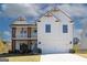 Inviting two-story home featuring a white exterior, a balcony, and a spacious two-car garage at 4130 Chapel Hill Reserve, Douglasville, GA 30135