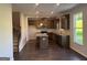 Kitchen with island, stainless appliances, and hardwood floors at 4130 Chapel Hill Reserve, Douglasville, GA 30135
