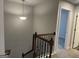 Upstairs hallway with railing overlooking the stairway at 4130 Chapel Hill Reserve, Douglasville, GA 30135