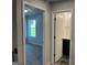 Upstairs hallway with bedroom on the left and full bathroom on the right at 4130 Chapel Hill Reserve, Douglasville, GA 30135