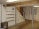 This unfinished basement space has concrete floors, exposed ceilings, and support beams at 2102 Mulkey Sw Rd, Marietta, GA 30008