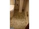 Detailed shot of bathroom flooring, showcasing geometric tile design and grout lines at 2102 Mulkey Sw Rd, Marietta, GA 30008
