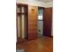 Bedroom featuring hardwood floors, a closet, and connected bathroom at 2102 Mulkey Sw Rd, Marietta, GA 30008