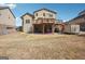 Expansive backyard featuring a deck, partial brick exterior, and ample outdoor space for recreation and relaxation at 3863 Rosebay Way, Conyers, GA 30094