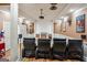 Spacious home theater with projector setup and comfortable seating for an immersive viewing experience at 3863 Rosebay Way, Conyers, GA 30094