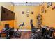 An office features a TV and streaming equipment, a desk and an office chair at 3863 Rosebay Way, Conyers, GA 30094