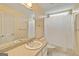 Bathroom featuring a mirror, vanity, white fixtures, and a shower with a curtain at 211 Collierstown Way, Peachtree City, GA 30269