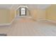 Bonus room with beige walls, carpet flooring, and a dormer window at 211 Collierstown Way, Peachtree City, GA 30269