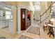 Grand foyer featuring high ceilings, staircase, and decorative furnishings at 211 Collierstown Way, Peachtree City, GA 30269