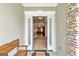Grand two-story foyer showcasing an open staircase and elegant chandelier at 211 Collierstown Way, Peachtree City, GA 30269