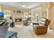 Cozy living room features a fireplace and comfortable seating at 211 Collierstown Way, Peachtree City, GA 30269