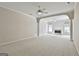 Expansive living room with ample space and neutral carpet at 211 Collierstown Way, Peachtree City, GA 30269