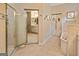 Classic bathroom with standing shower, tub, and bathroom vanity at 211 Collierstown Way, Peachtree City, GA 30269