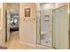 The bathroom offers a standing shower with gold trim at 211 Collierstown Way, Peachtree City, GA 30269