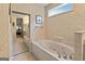 Classic bathroom offers tub and vanity at 211 Collierstown Way, Peachtree City, GA 30269