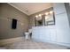 Bathroom featuring dual sinks, vanity, and clean white cabinets, offering a serene and functional space at 2304 Larchmont Ct, Villa Rica, GA 30180