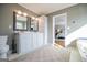 Bathroom includes dual sinks, framed mirrors, and access to the bedroom at 2304 Larchmont Ct, Villa Rica, GA 30180