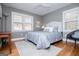 Bright bedroom featuring natural light and neutral color scheme at 2304 Larchmont Ct, Villa Rica, GA 30180
