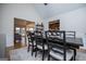 Dining room showcasing an expansive view of the living room, kitchen, and lake at 2304 Larchmont Ct, Villa Rica, GA 30180