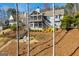 Exterior of home featuring a screened porch and spacious outdoor deck at 2304 Larchmont Ct, Villa Rica, GA 30180