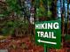 Directional sign to a local hiking trail at 2304 Larchmont Ct, Villa Rica, GA 30180