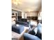 Cozy living room with plush seating, neutral tones, and a relaxing atmosphere at 2304 Larchmont Ct, Villa Rica, GA 30180