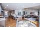 Open-concept living spaces that showcase the kitchen, living room, and dining areas with hardwood floors throughout at 2304 Larchmont Ct, Villa Rica, GA 30180