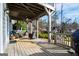 Spacious deck area with ample seating, overlooking a landscaped backyard and wooded area at 2304 Larchmont Ct, Villa Rica, GA 30180