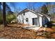 Backyard with partial patio and lush foliage at 626 N Fairfield Dr, Peachtree City, GA 30269