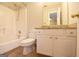Bathroom with combined bath and shower, a vanity, and a granite countertop at 626 N Fairfield Dr, Peachtree City, GA 30269