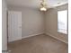 Bedroom with neutral walls and standard carpet at 626 N Fairfield Dr, Peachtree City, GA 30269