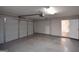Spacious garage with access door and open layout at 626 N Fairfield Dr, Peachtree City, GA 30269