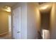 Hallway showing the entrance to the attic and the staircase to the first floor at 626 N Fairfield Dr, Peachtree City, GA 30269