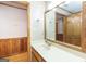 Bathroom featuring laminate countertop, wood cabinets and trim, and updated fixtures at 222 Providence Rd, Fayetteville, GA 30215