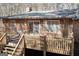 Large wooden deck outside of the home, perfect for relaxing outdoors at 222 Providence Rd, Fayetteville, GA 30215