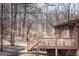 Spacious wooden deck overlooking wooded area, ideal for outdoor living at 222 Providence Rd, Fayetteville, GA 30215