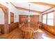 Well-lit dining room with hardwood floors, storage, and a dining table at 222 Providence Rd, Fayetteville, GA 30215
