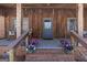Charming front porch with rocking chairs and beautiful flower arrangements at 222 Providence Rd, Fayetteville, GA 30215