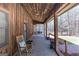 Expansive front porch featuring a swing, rocking chair, and scenic views at 222 Providence Rd, Fayetteville, GA 30215