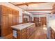 Well-equipped kitchen with hardwood floors, a center island, and lots of storage at 222 Providence Rd, Fayetteville, GA 30215