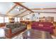 Spacious living room with exposed beams and hardwood flooring at 222 Providence Rd, Fayetteville, GA 30215