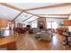 Spacious living room with exposed beams, fireplace, and hardwood floors at 222 Providence Rd, Fayetteville, GA 30215