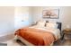 Cozy bedroom featuring soft lighting, warm colors, and a plush bed at 734 Lanarck Way, Peachtree City, GA 30269