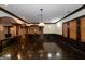 Open basement area featuring hardwood floors, dark trim and recessed lighting with adjacent rooms at 2279 Fieldstone Dr, Conyers, GA 30013