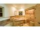 Luxurious bathroom featuring a soaking tub, tiled shower, and unique stained glass window at 2279 Fieldstone Dr, Conyers, GA 30013