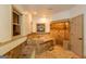 Elegant bathroom featuring a soaking tub, a tiled shower, and custom vanity at 2279 Fieldstone Dr, Conyers, GA 30013